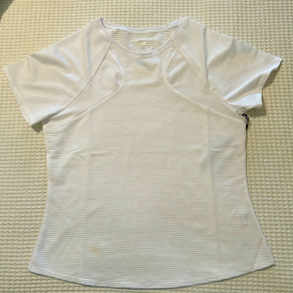 Short sleeve tennis shirt made by Tail